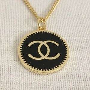 Chanel black enamel pendant